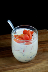 Yogurt ice cream with chocolate slices