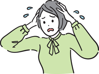 頭を抱えている女性