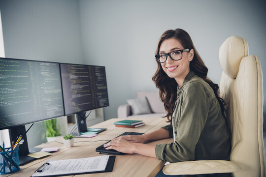 Profile side photo of smiling charming successful lady hardware expert working overtime hacking checking sites indoor workstation