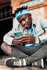 Cool African Man Using Phone