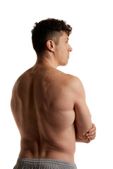 Fototapeta premium Side view photo of mature man posing shirtless in pants over white studio background. Relief, strong back. Men's health and beauty