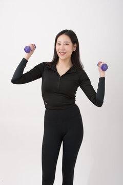 Cropped image of determined woman losing weight at home. Sport and lifestyle concept.