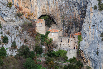 Fototapeta na wymiar The hermitage of Saint-Antoine de Galamus, located within the gorges of Galamus,