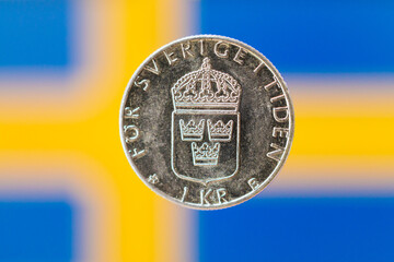 Sweden 1 krona 1982-2000 - Swedish flag in the background - obrazy, fototapety, plakaty
