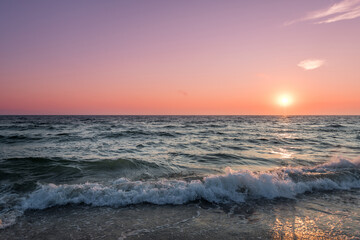 Fototapeta na wymiar Beautiful Sunset Light in Lithuania. Baltic Sea Waves.