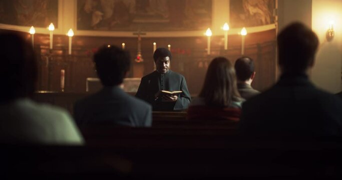 Service Sermon In Christian Church: Portrait of Minister Leading Congregation In Prayer, Reads From Holy Book, The Bible, Gospel of Jesus. Priest Providing Guidance, Belief, Hope, Faith to People