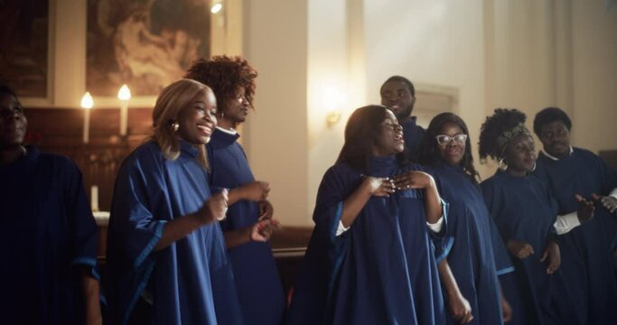 Black Christian Gospel Singers in Church Clapping and Stomping, Praising Lord Jesus Christ. Song Spreads Harmony Joy and Faith. Energetic Choir Sharing the Message of Christianity with Uplifting Music
