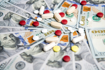 medicine finance and illness insure. money for medicine finance in closeup and selective focus.