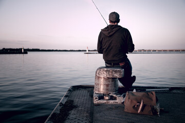 Fisherman catching fish at the baltic sea, Germany