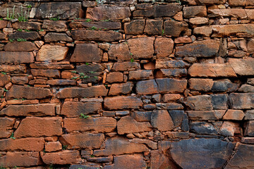 Red stone brick wall in San Ignacio Ruins, Misiones, Argentina