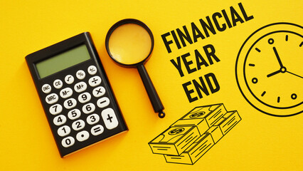 Financial year end is shown using the text - obrazy, fototapety, plakaty