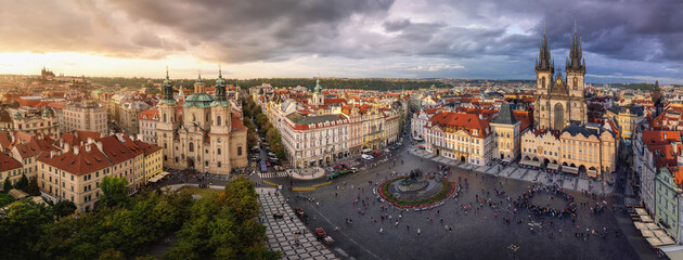 Panoramic aerial view of Old Town Square with Tyn Church and St. Nicholas Church - Prague, Czech...