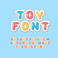 Toy kids font. Cute childish alphabet. Playful letters and numbers.
