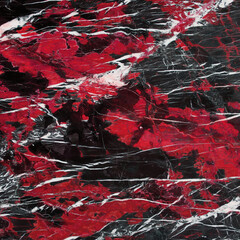 Marble tile background. Abstract texture. Black, red and white veins pattern. 