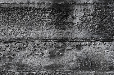 Fototapeta premium Dark concrete wall with imprint relief of wooden formwork