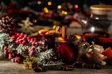 christmas hot mulled wine hot warming drink with spices and oranges