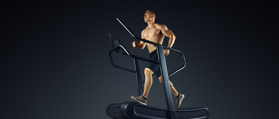 Shirtless Male athlete running on Motorless Curved Sprint Treadmill. Conceptual wide banner studio...