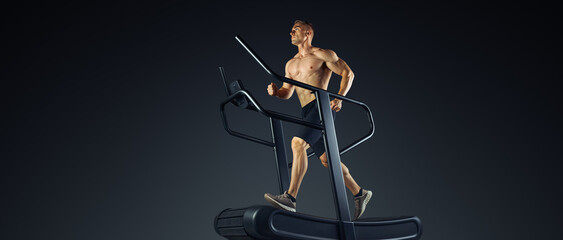Shirtless Male athlete running on Motorless Curved Sprint Treadmill. Conceptual wide banner studio photo. Professional treadmill, Jogging machines