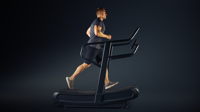 Running Man. Sportsman Training On Motorless Curved Sprint Treadmill. Speed, Time, Step Count, Distance And Calories Burned. Working Out At Home, Circuit Training, Sprints, Short Distances And Walking