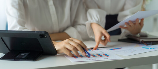 Friends of asia female employee worker discussing and accountant checking data document for investigation of corruption account. Anti Bribery concept, great business conversations