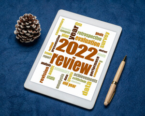 2022 year review word cloud on a digital tablet, end of year business analysis concept