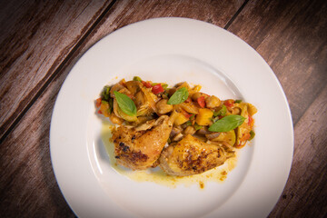Recipe for grilled basquaise chicken with vegetables in ratatouille. High quality photo