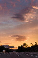 Road landscape at sunset, travel
