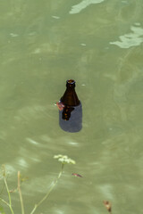  Floating Empty Beer Bottle