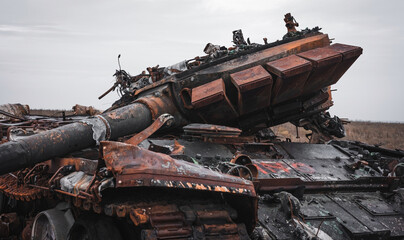Fototapeta na wymiar War in Ukraine, a tank with a torn turret, close-up, Kharkiv region
