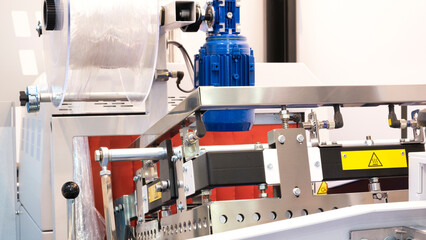 Conveyor Filling and Packaging Machine for Food. product packaging concept, buckwheat groats