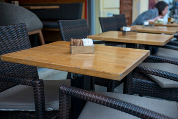 tables and chairs in an outdoor restaurant