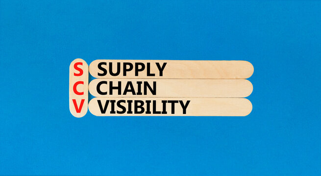 SCV supply chain visibility symbol. Concept words SCV supply chain visibility on wooden sticks on beautiful blue table blue background. Business SCV supply chain visibility concept. Copy space.
