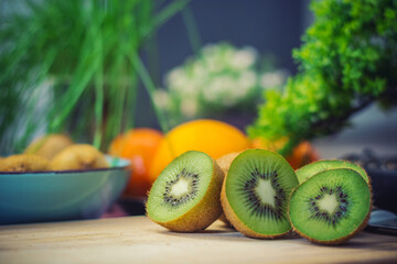 cut kiwi on the table with colorfull background