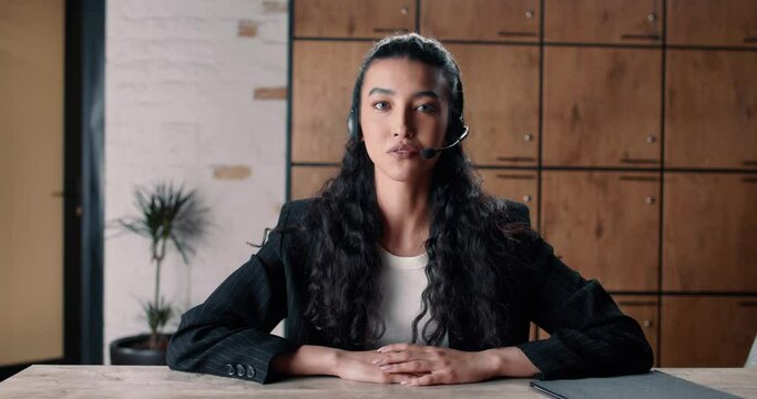 Young multiethnic woman introduces and talks about her company online business meeting. Woman leader successful company talks about her business. Establishment of mutually beneficial market relations