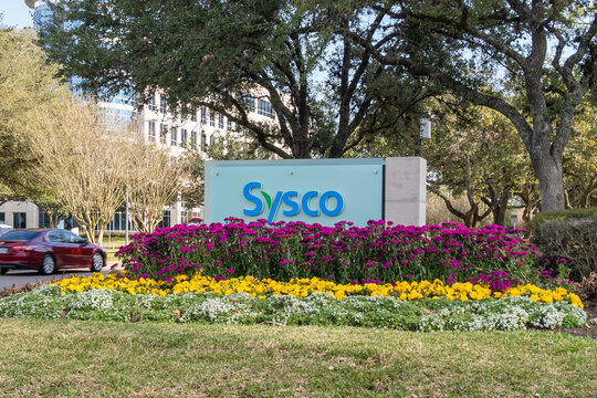 Houston, Texas, USA - March 2, 2022: Sysco&rsquo;s sign at its headquarters in Houston, Texas, USA. Sysco is an American global leader in selling, marketing and distributing food and non-food products. 