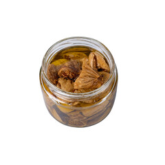 dried figs in a jar, isolated on a white background