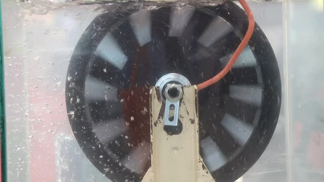 Electric scooter hub motor or BLDC motor for electric vehicles running inside water to show its waterproofing