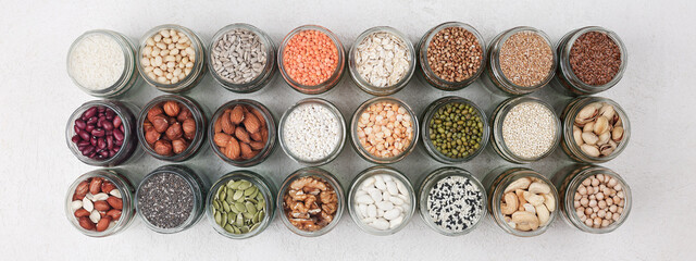 Vegan protein source. healthy vegetarian food. top view of seeds, nuts, pea, bean, rice, spelt,...