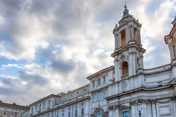 Fototapeta premium Sant'Agnese in Agone in Piazza Navona. Historic Landmark in Rome, Italy. Cloudy Sky.