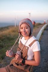 girl taking a walk watching the sunset on vacation evening 15-12-2022