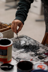 painter mixing colors