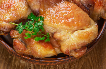fried chicken meat with appetizing skin in oil
