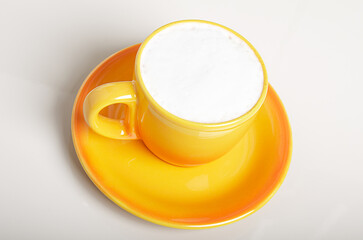 mug of aromatic coffee with milk