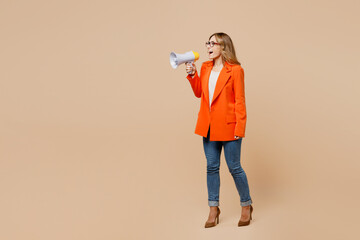 Full body young successful employee business woman corporate lawyer 30s wear classic formal orange...
