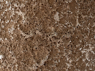 The texture of the stone. Macro photo. Rough wall texture.