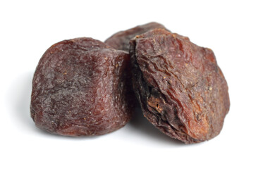 Whole Sun-dried apricots with stones. Isolated on white background