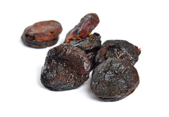 Whole Sun-dried apricots without stones. Isolated on white background