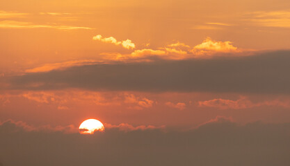 Colorful clouds at sunset as background.