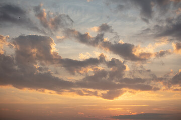 Colorful clouds at sunset as background.