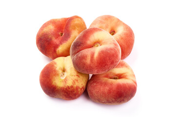 Flat Peaches, ripe nectarines, isolated on white background.